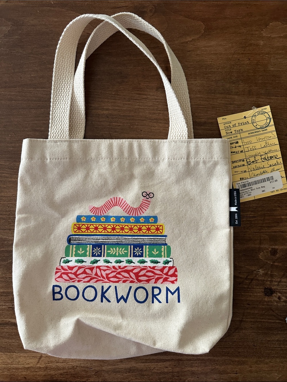 Out of Print Natural Canvas 'Bookworm' Tote with Colorful Book Stack - Picture 2 of 3